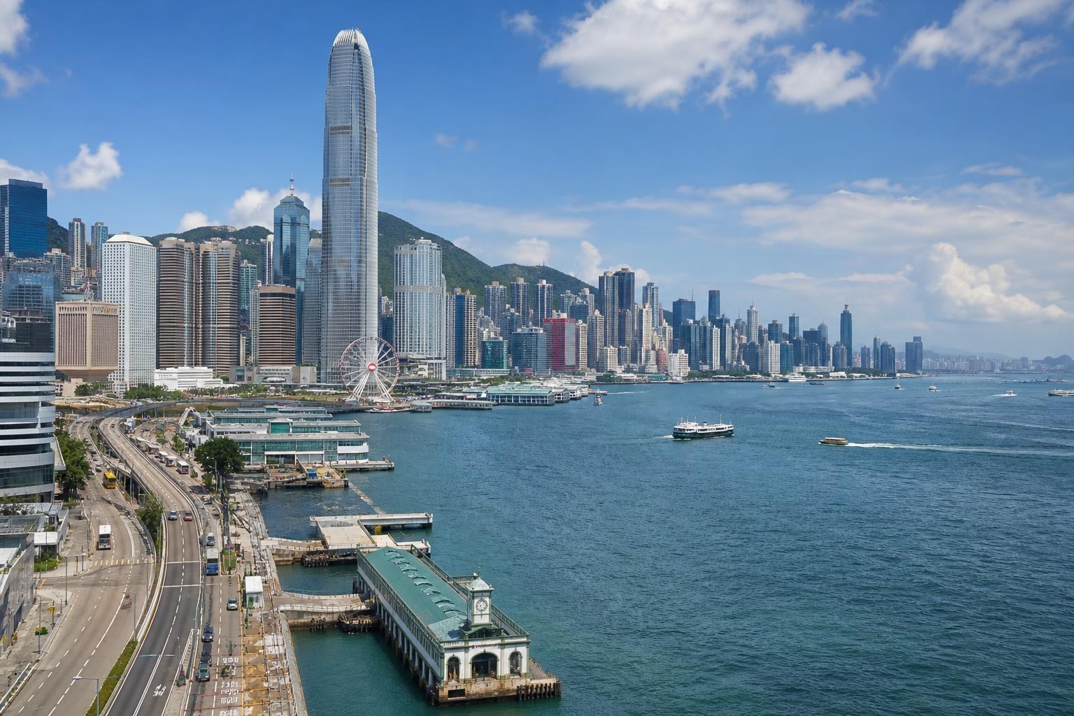 Illustrative Hong Kong skyline and Victoria Harbour under a blue sky.